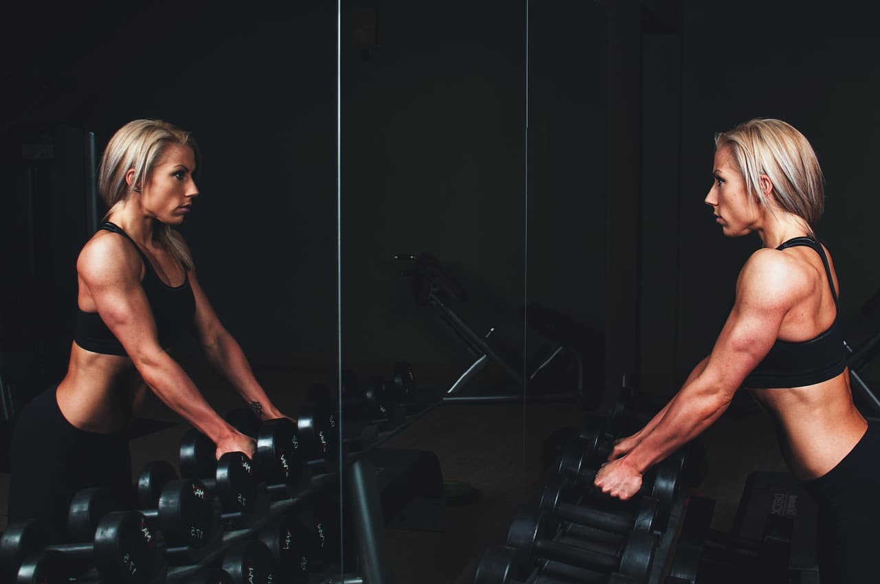 Fitness training environment with dumbbells